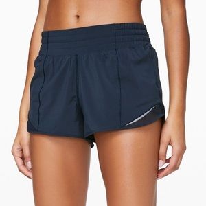 Size 4, 4 inch, high rise, true navy hotty hots Lululemon shorts